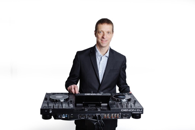 Chase March Chase March working the crossfader of the DJ controller